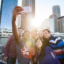 Students on a CityCat boat, Brisbane River