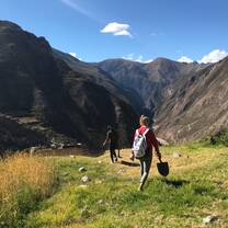 This is an image of my friend as we descend into the Sacred Valley on one of our days of service. All I remember from this moment is how serene the whole scene seemed: the crystal blue sky, the dewy, green grass, and the sublime mountains shooting up from the creeks below.