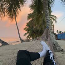 Relaxing on a hammock and watching the sun rise after turtle watching.
