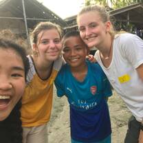 Myself and the two other girls from Bang Doni's homestay taking a selfie with Nai after an intense game of volleyball