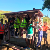 My service group at a chicken coop we helped build. 