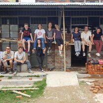 Building school Volunteers at build site