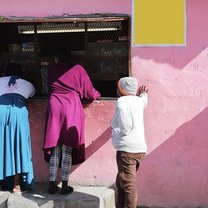 Three of the citizens of Vrygrond, Cape Town at a local store 