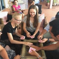 Playing cards with friends.