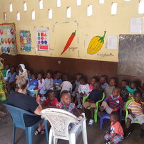 Class English LESSON with teacher and volunteers