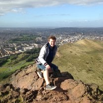 Sitting on Arthur’s Seat, Edinburgh 