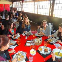 myTEFL interns eating a local meal together.