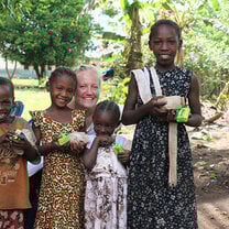 Smiling locals with a TEFL teacher.