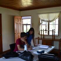 student receiving instructions from teacher