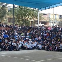 My favorite picture. The Global Volunteer group with the entire Sagrada Familia community Community Photo with Global Volunteers ( in front in white shirts ) on last day.