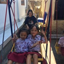Pushing the children on the swing during their break time - it became like a mandatory activity!