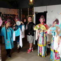 group of people dressed in traditional garments
