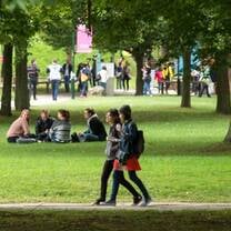 Students walking through the green campus