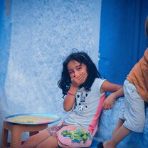 Support the local staff with taking care of the children 