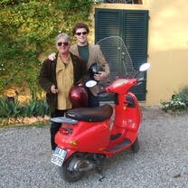 Student with host family and red vespa