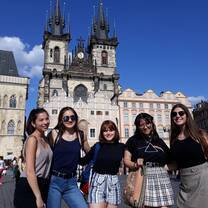 students in front of a church in Prague