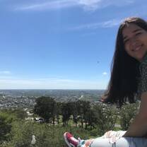 A student poses overlooking the city of Montevideo. 
