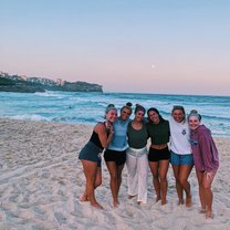 A sunset beach trip with my roommates where we also came prepared with a picnic and blankets.