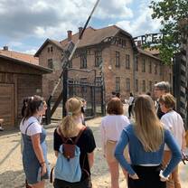 students getting a tour of Auschwitz Concentration Camp