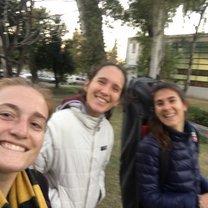 My friends Rocío, Guille, and I after hockey practice as they walk with me to English Talk 