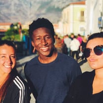 Close up of three students on a trip to Abruzzo