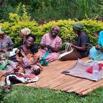 Learning how to weave rugs with the ladies. 