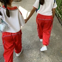 Two students walking to class