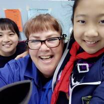 Tania with two of her students. Lots of love in the Laoshan school.
