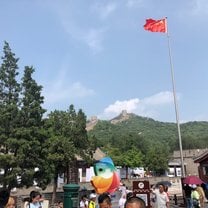 Chinese flag near entrence to great wall