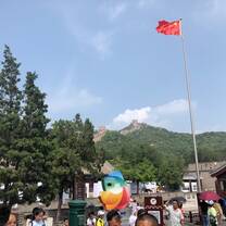 Chinese flag near entrence to great wall