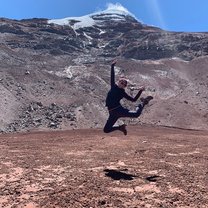 Jumping at the base camp two of the volcano Chimborazo