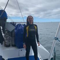 Smiling after finishing a snorkeling session in the Galapagos