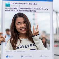 UCL Summer School student enjoying the End of Summer Boat Party on the River Thames