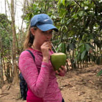 Drinking straight from a coconut