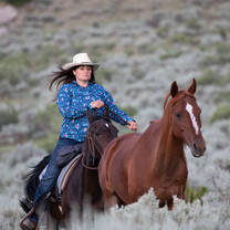 Feel the breeze in your hair as you canter after the horses.