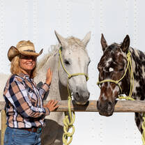 Poncho and Fern with Karen at the hitching post waiting to head up the trail.