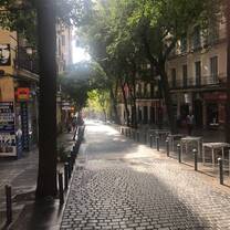 Lucas, an RVF International participant, capturing a serene cobblestone street in Madrid, Spain, lined with trees and historic buildings, showcasing the beauty and culture experienced while teaching abroad with RVF International.