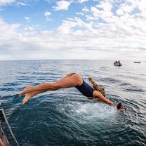 Diving off a boat in Lagos, Portugal.