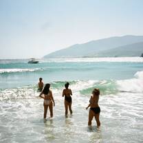 Students on a school trip to the Island of Andros beach 