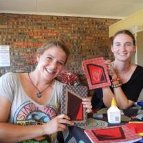 Women knitting with Basadi Skills Program