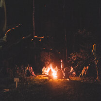 A nightly bonfire surrounded by interns at Hoja Nueva.
