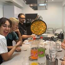 Eating paella with a host family in Seville.