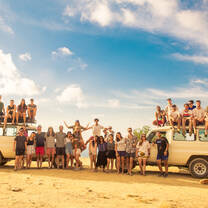 Student group with troop-carriers on the weekend