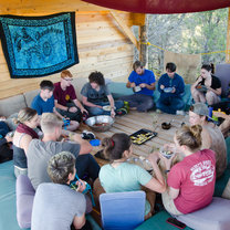 Participants and staff sharing a dinner on "the deck."