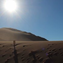 Sun setting over a desert landscpae