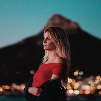 Standing on the beach during sunset with Lion's Head in the background