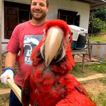 Bar feeding time Our former volunteer Jonathan working with Bar