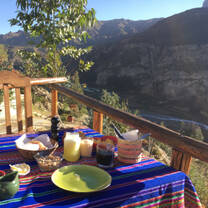 Meal time view over mountains