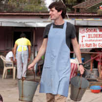 Volunteer helping carry