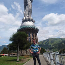 Volunteer with statue